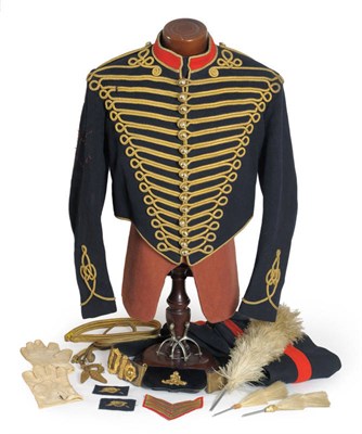 Lot 199 - A Dress Uniform to the Royal Horse Artillery, comprising a blue tunic with gilt frogging, red faced