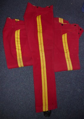 Lot 201 - Three Pairs of Hussar's Overall Trousers, in crimson wool with yellow stripes, one bearing...