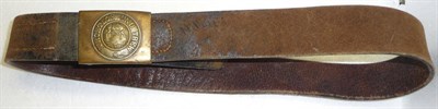 Lot 203 - A First World War German Army Brown Leather Belt, the brass buckle embossed with the coat of...