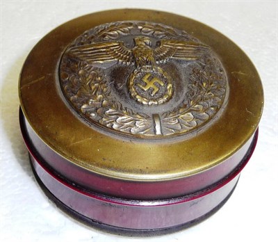 Lot 215 - A German Third Reich Brass and Composition Snuff Box, of compressed cylindrical form, the screw...