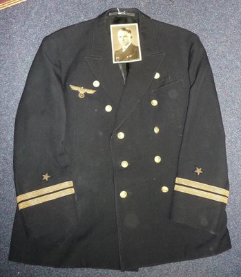 Lot 225 - A German Third Reich Navy Jacket, with gilt buttons, gilt metal thread breast eagle, with cuff...