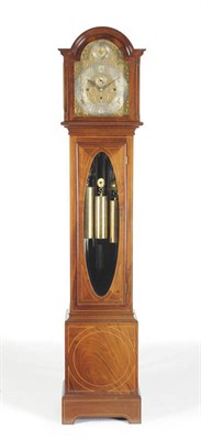 Lot 1308 - An Edwardian Mahogany Chiming Longcase Clock, retailed by Pearce & Sons, Leicester, the arched...