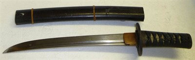 Lot 254 - A 16th Century Japanese Tanto Dagger, the 26cm steel blade with a narrow fuller to the top...