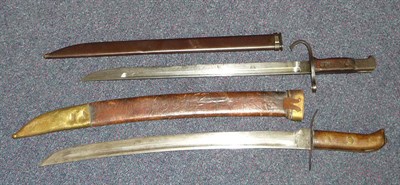 Lot 261 - A Japanese Second World War Boarding Cutlass, 44.5cm single edge curved steel blade with a...