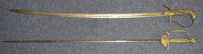 Lot 304 - A Victorian Court Sword, with 80.5cm etched steel blade, the brass hilt with shell guard...