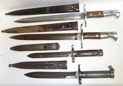 Lot 317 - Four Bayonets :- two Swiss Model 1918 "Schmidt-Rubin" Knife Bayonets, one with blade stamped...