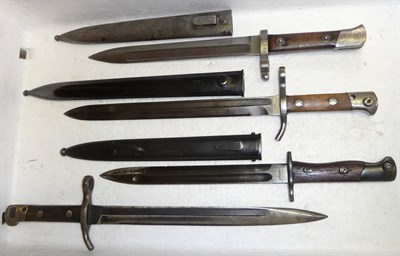 Lot 319 - Four Bayonets:- two Finnish Model 1927 Knife Bayonets, one with blade stamped HACKMAN & Co.,...