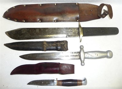 Lot 321 - A Bowie Knife, with hatchet tip steel blade, nickel crossguard, two piece bark effect black plastic