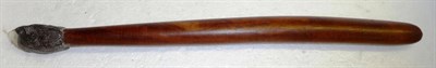 Lot 330 - An Australian Aborigine Hand Tool, the rounded tapering cylindrical hardwood haft with moulded clay