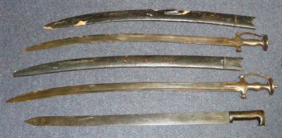 Lot 337 - Two Early 19th Century Indian Talwars, each with single edge curved and fullered steel blade...