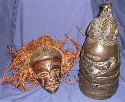 Lot 350 - A Mende Sowai (Helmet) Mask, in dark stained soft wood, with woven topknot, small facial...