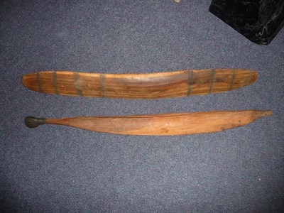 Lot 353 - An Australian Aborigine Heavy Hardwood Parrying Club, the fascia incised with eight horizontal...