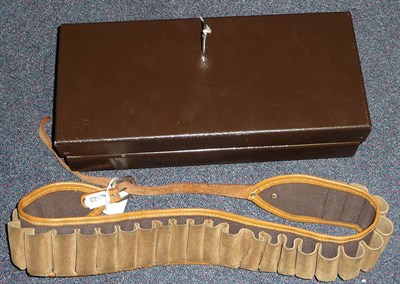 Lot 356 - A Wall Mounted Gun Safe, with key; a Canvas and Suede Cartridge Belt. (2)