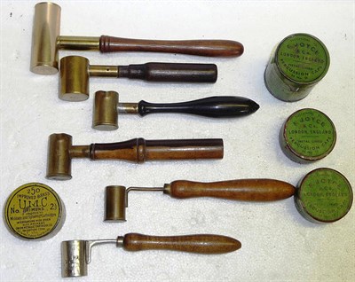 Lot 370 - Accessories:-Two French/Belgian powder measures with beech handles, four other powder measures with