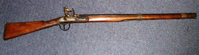 Lot 444 - A 19th Century Native Flintlock Musket, the 76.5cm steel barrel octagonal at the breech and stamped