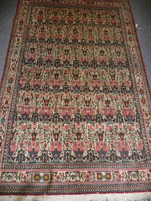 Lot 1334 - Zili Sultan Rug South East Persia The ivory field with columns of urns issuing flowers enclosed...