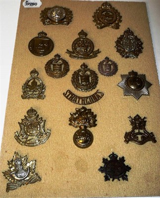 Lot 100 - A Collection of Approximately Eighty Cap Badges and Shoulder Titles, predominantly Canadian...