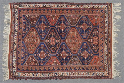 Lot 1341 - Afshar Rug South East Persia The indigo/madder stepped lozenge field with zoomorphic and...