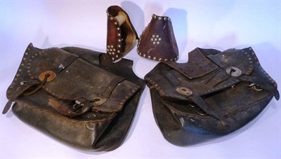 Lot 119 - A Pair of American Leather Saddle Bags, each embossed with an American Bald eagle, with white metal