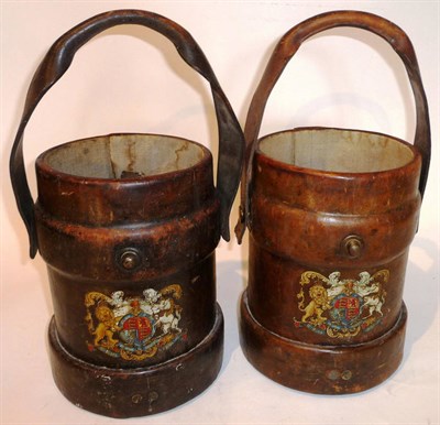 Lot 125 - Two Second World War Leather Shell Carriers, each with rolled leather swing handle, Royal Coat...