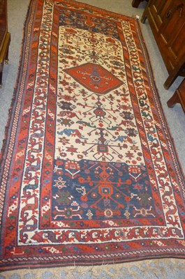 Lot 1346 - Afshar Rug South East Persia The ivory panel field with central octagon flanked by twin indigo...