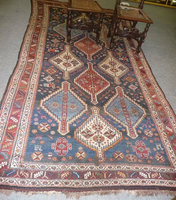 Lot 1348 - Luri/Bakhtiari Carpet West Persia The deep indigo field with three rows of stepped polychrome...