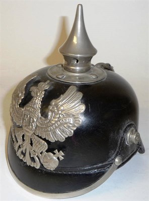 Lot 185 - A Prussian Black Leather Pickelhaube, with white metal fittings of  a removable vented spike,...