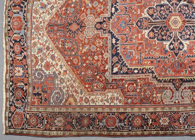 Lot 1349 - Heriz Carpet Persian Azerbaijan The madder field of angular vines around an indigo and salmon...