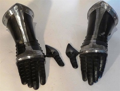 Lot 190 - A Pair of 17th Century Style "Black and White" Steel Gauntlets, each painted black with...