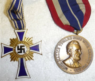 Lot 213 - A German Third Reich Mother's Cross, gold class, with ribbon; an American Civil War 1861-1865...