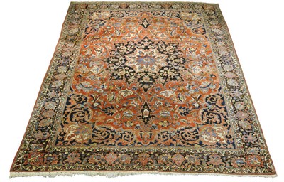 Lot 1352 - Bakhtiari Carpet The shaded blood red field of polychrome vines and flowers around an indigo...