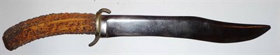 Lot 272 - A Bowie Knife, with 26.5cm plain curved steel blade, brass recurving crossguard, and antler handle