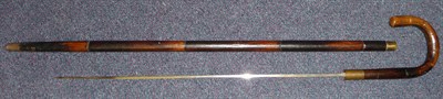 Lot 275 - An Early 20th Century French Swordstick, 55cm square tapering steel blade stamped Leon, in...