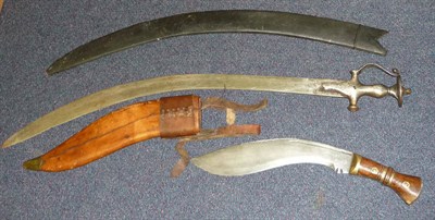 Lot 279 - A Copy of a Military Issue Kukri, the curved steel blade stamped with broad arrow Co I...