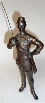 Lot 309 - A Bronzed Spelter Figure of a Prussian Hussar Officer, standing wearing a frogged tunic, small side