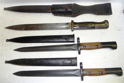 Lot 312 - A German Third Reich Model 1884/98 Knife Bayonet, the steel blade stamped Carl Eickhorn,...