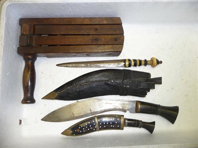 Lot 323 - An Indian Dagger, with double edge steel blade and sectional bone and horn grip; an Indian...