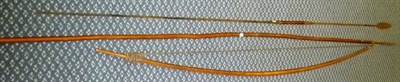 Lot 338 - An African Wood Self Bow, with gut string, 176cm; an African Spear, with small leaf shape head,...