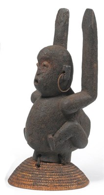 Lot 354 - A Bulu/Bwete, Cameroon Carved Wood Monkey Headdress,  with upraised arms and bent legs, open...