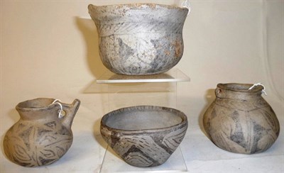 Lot 362 - Four Pieces of Pre Columbian Pottery, comprising three bowls  and a spouted jug, all with black...