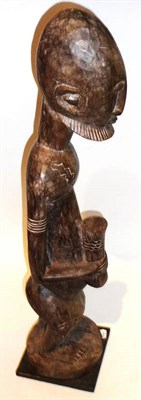 Lot 364 - A Large Bambara, Mali Wood Figure of a Bearded Man, with ovoid head, small coffee bean eyes,...