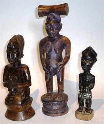 Lot 367 - A Yoruba, Nigeria Maternity Figure, standing, her hands resting on her swollen stomach,...