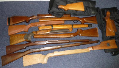 Lot 389 - Eleven Various Wood Gun Stocks, and a plastic example; two shotgun slips and two hard plastic...