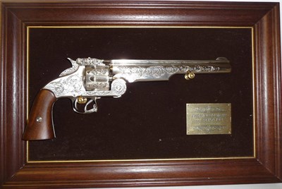 Lot 419 - A Franklin Mint Non-Working Model of the Wyatt Earp .44 Six Shot Revolver, mounted on a display...