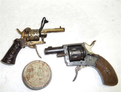 Lot 444 - A Belgian Pin Fire Six Shot Pocket Revolver, with bird moulded bakelite grip; a Starting...