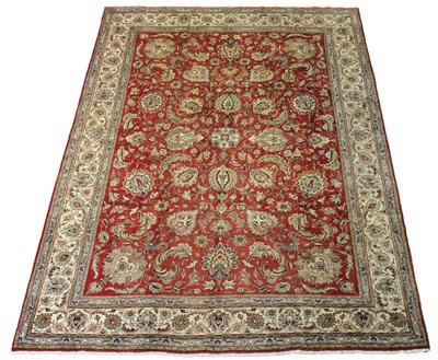 Lot 1376 - Tabriz Carpet Persian Azerbaijan The blood red field with an allover design of palmettes and...