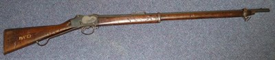 Lot 479 - An Enfield Martini Henry Mk IV Rifle, the 82cm blued steel barrel numbered A7717, one side of...