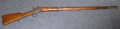 Lot 482 - A Remington Rolling Block Rifle, the 89cm steel barrel stamped with Arabic markings, with...