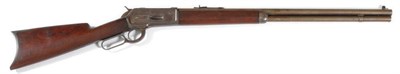 Lot 506 - A US Winchester Model 1886 Repeating Rifle .40-65 W.C.F. Calibre, the 66cm steel barrel stamped...