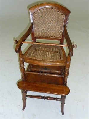 Lot 1405 - A Stained Beech Child's Chair on Stand, mid 19th century, the caned back support and seat...